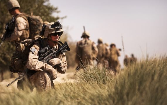 GOWRAGI, Helmand province, Islamic Republic of Afghanistan Ñ Lance Cpl. Kyle R. Lamoreaux, a squad automatic weapon gunner with the Combined Action Company, 3rd Battalion, 3rd Marine Regiment, holds security while on patrol in Gowragi, Afghanistan, during a clearing operation, Sept. 29, 2010. The clearing operation was followed by a sustained presence in the area. (Official Marine Corps photo by Sgt. Mark Fayloga)